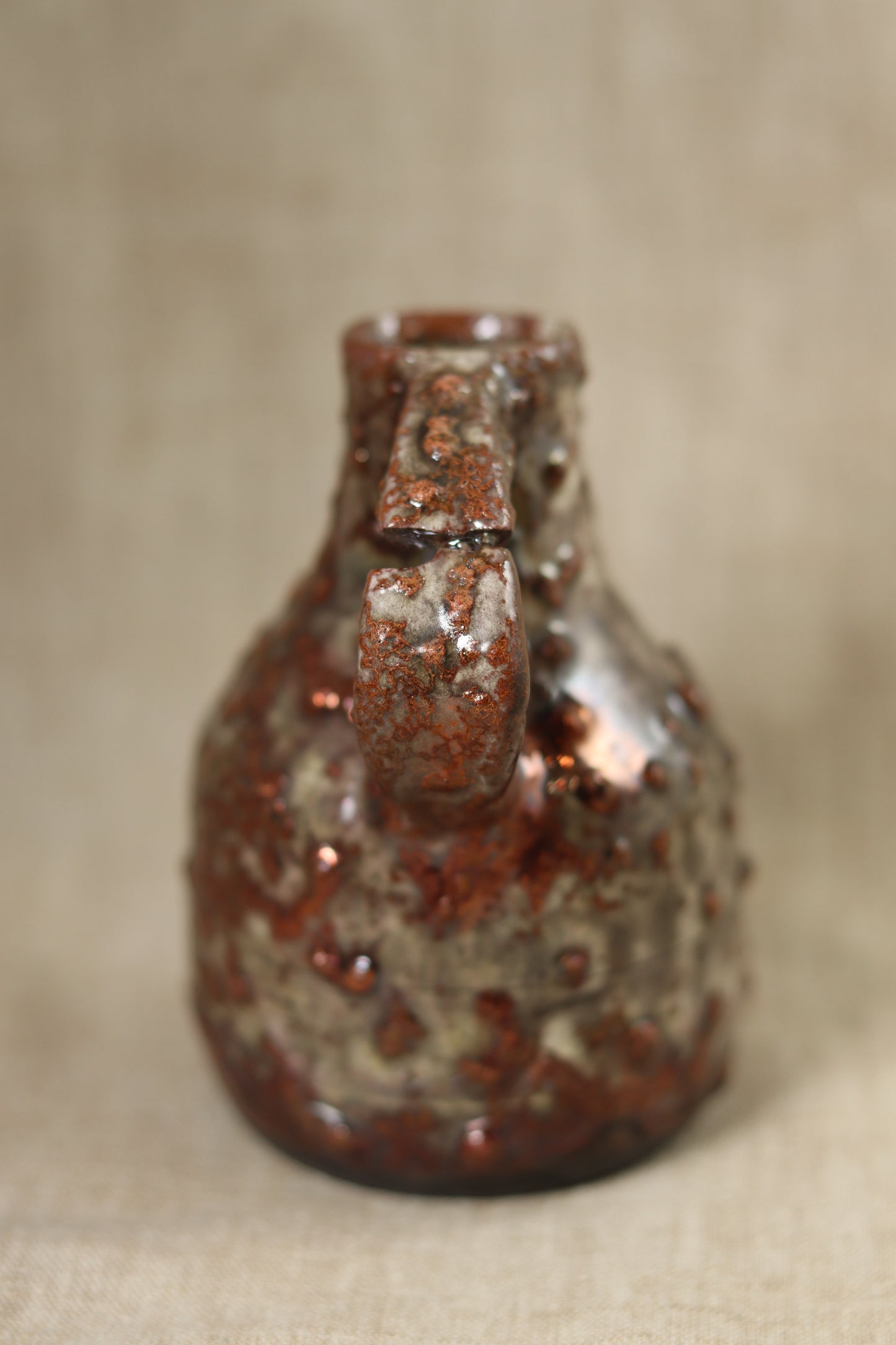 Tiny Ancient Bottle Raku